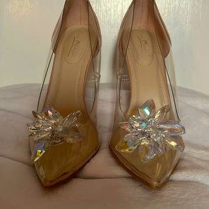 Gorgeous clear pump with crystal embellishment and nude patent heels.